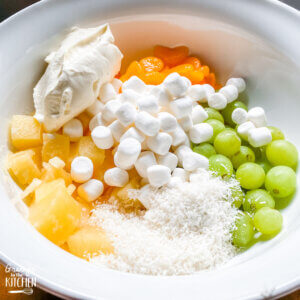 Hawaiian fruit salad ingredients in bowl