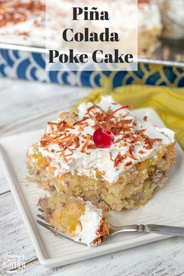 slice of pina colada poke cake with fork
