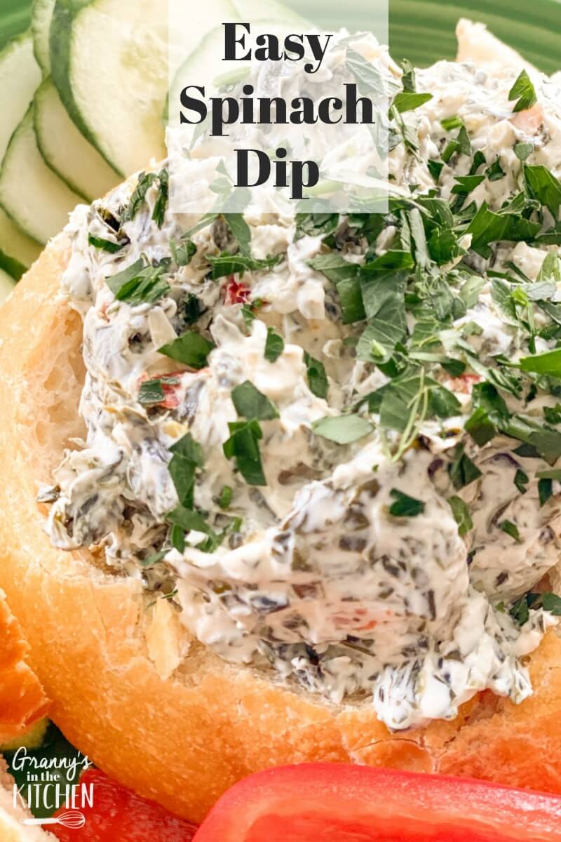 cold spinach dip served in a bread bowl