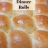fresh baked dinner rolls still in pan