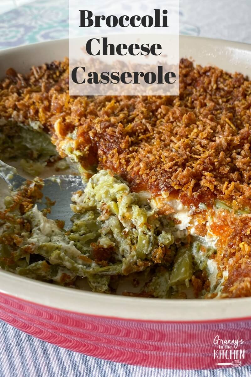 homemade broccoli and cheese casserole in red serving dish
