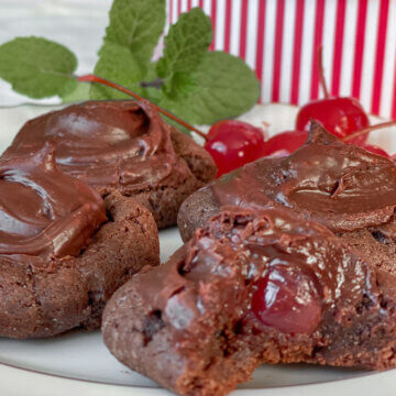 chocolate cookies with maraschino cherries in the middle