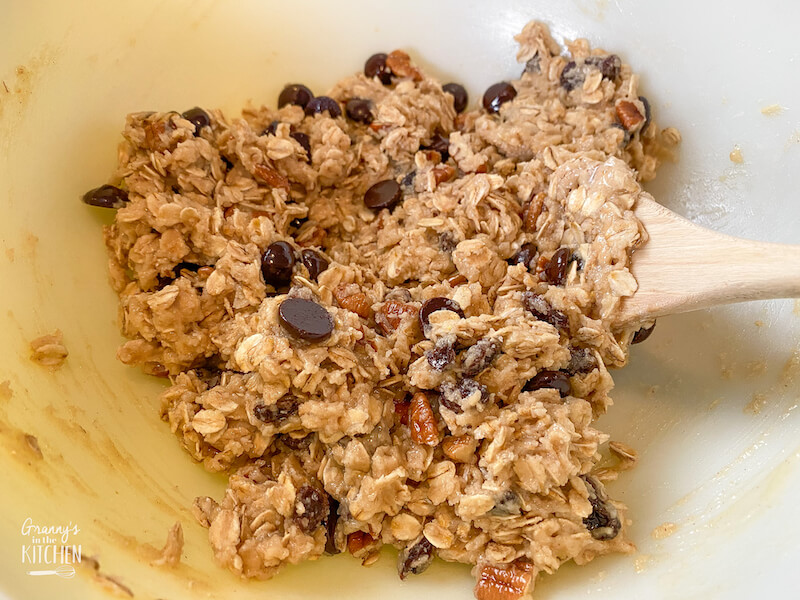 oatmeal chocolate chip cookie batter in mixing bowl