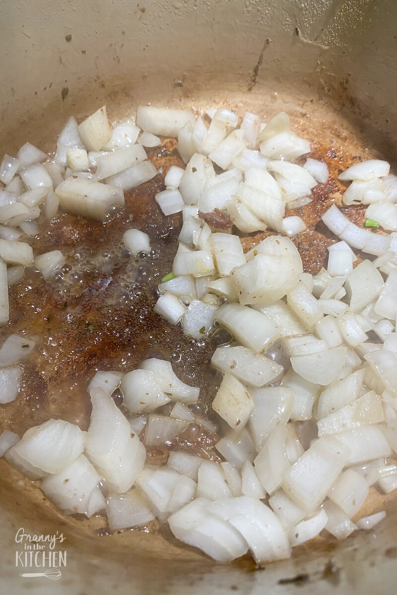 browning onions in pan