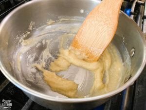 stirring butter and flour in saucepan