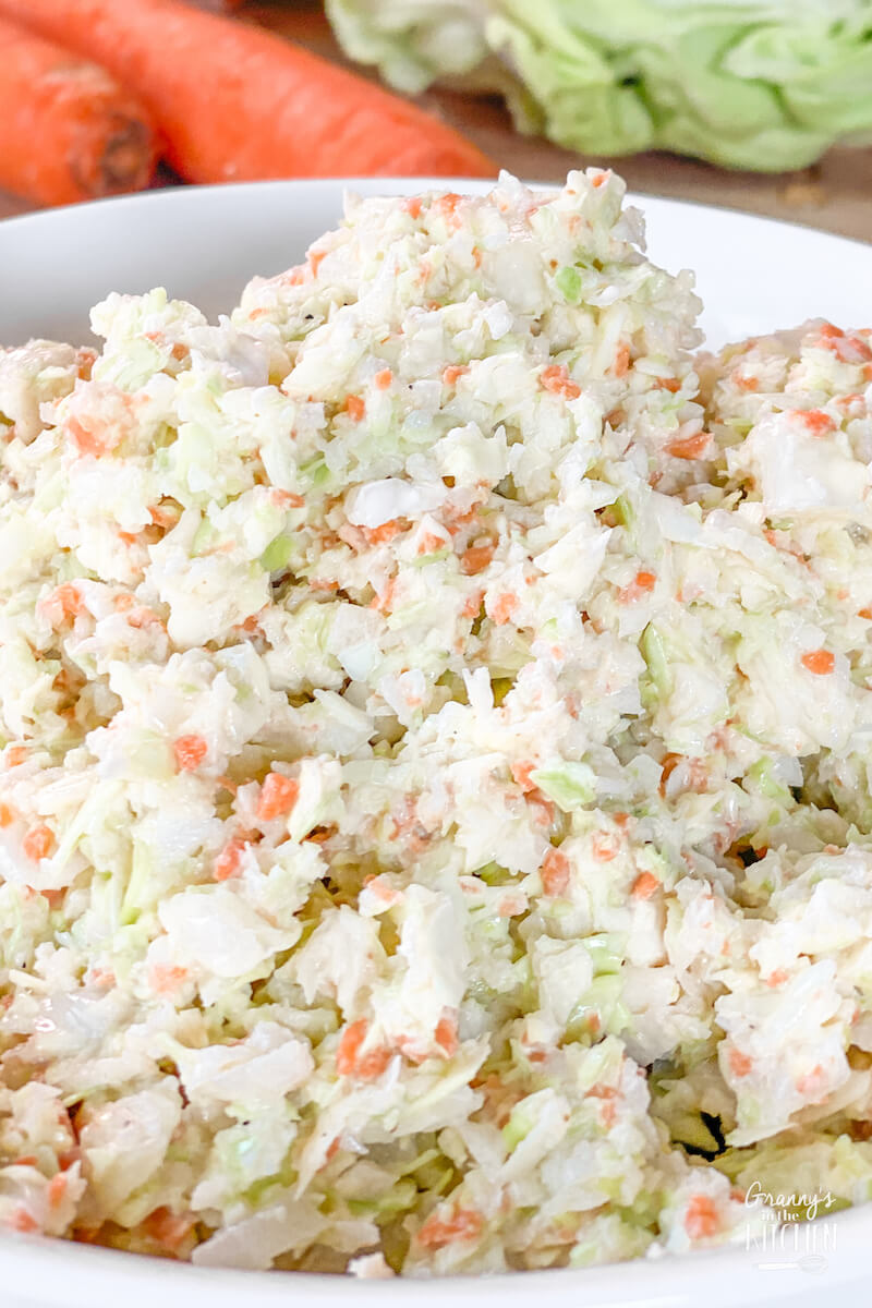 close up of homemade coleslaw in serving bowl