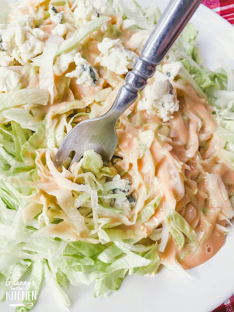shredded lettuce salad on fork