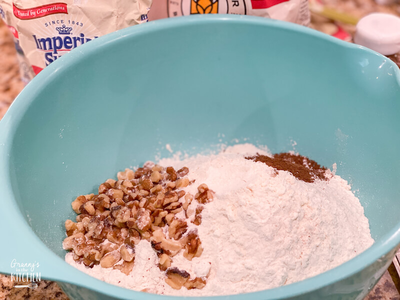 flour and walnuts in mixing bowl