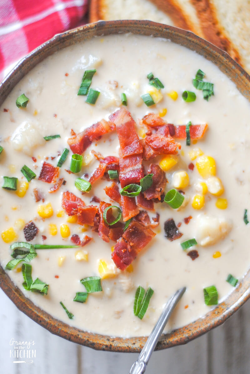 top down photo of a bowl of corn chowder with bacon
