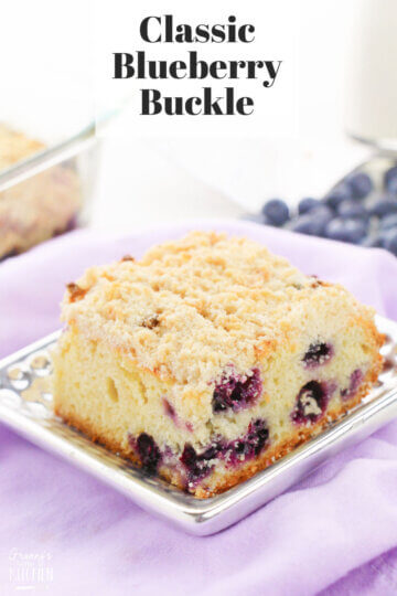 square of blueberry coffee cake; text overlay "Classic Blueberry Buckle"