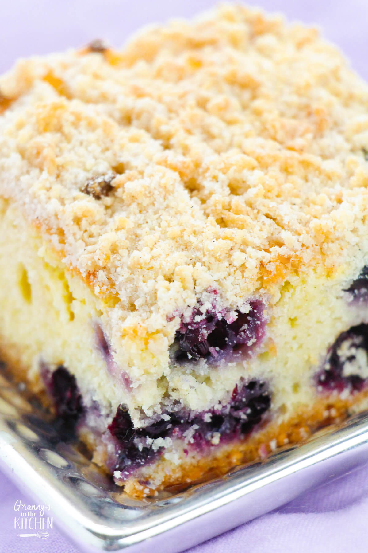 close up of a blueberry buckle cake