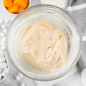 bowl of orange whipped topping