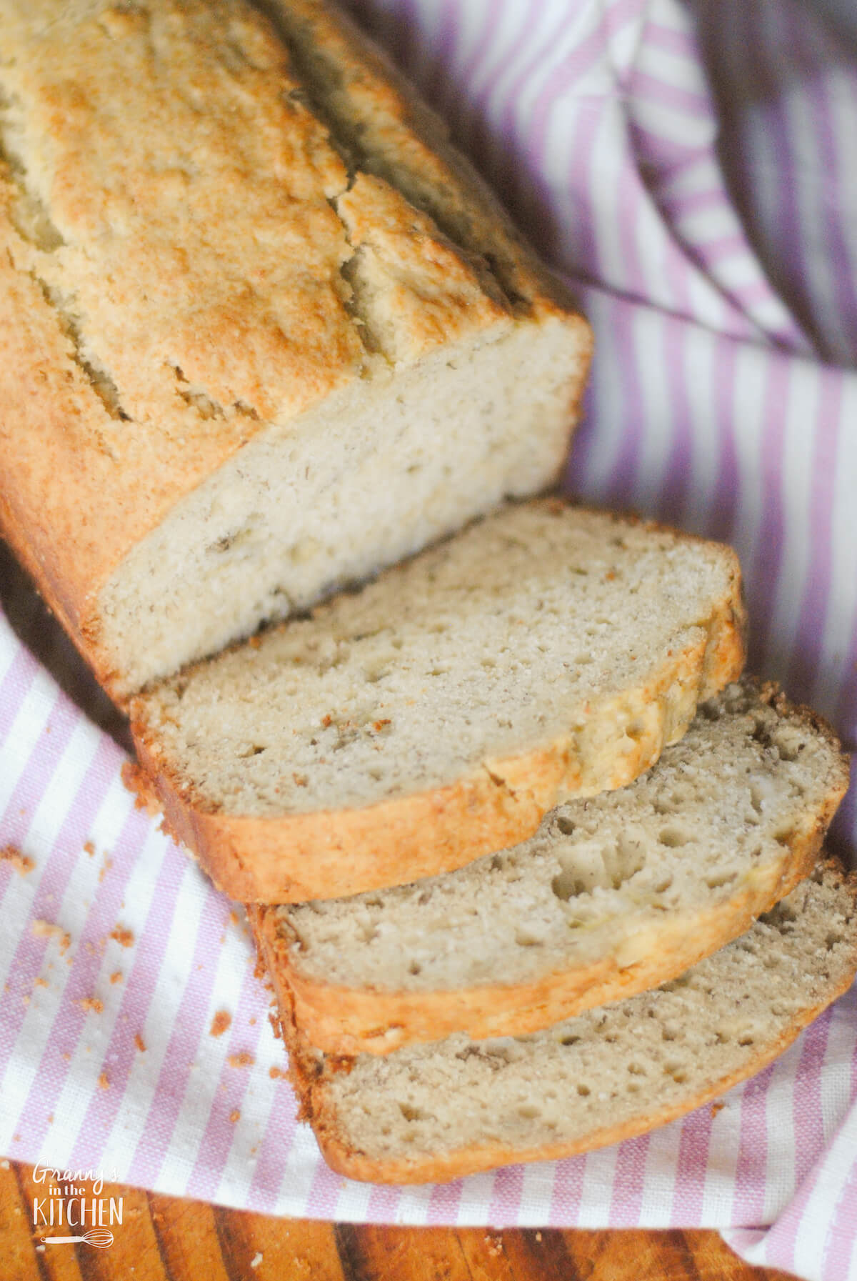 loaf of banana bread with 3 slices