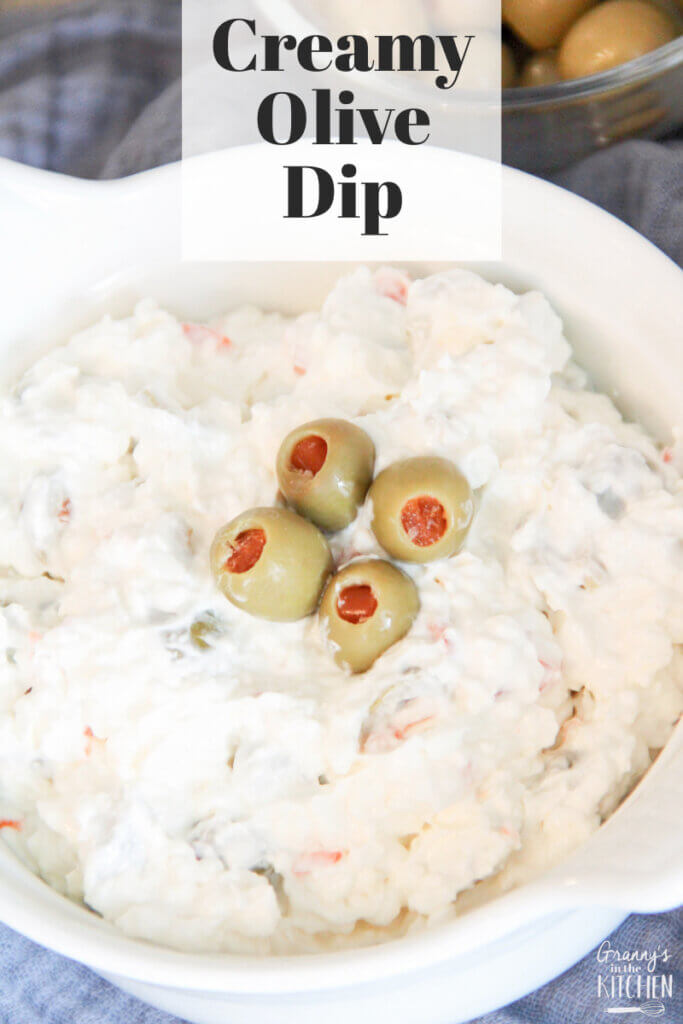 bowl of olive dip with text overlay "Creamy Olive Dip"