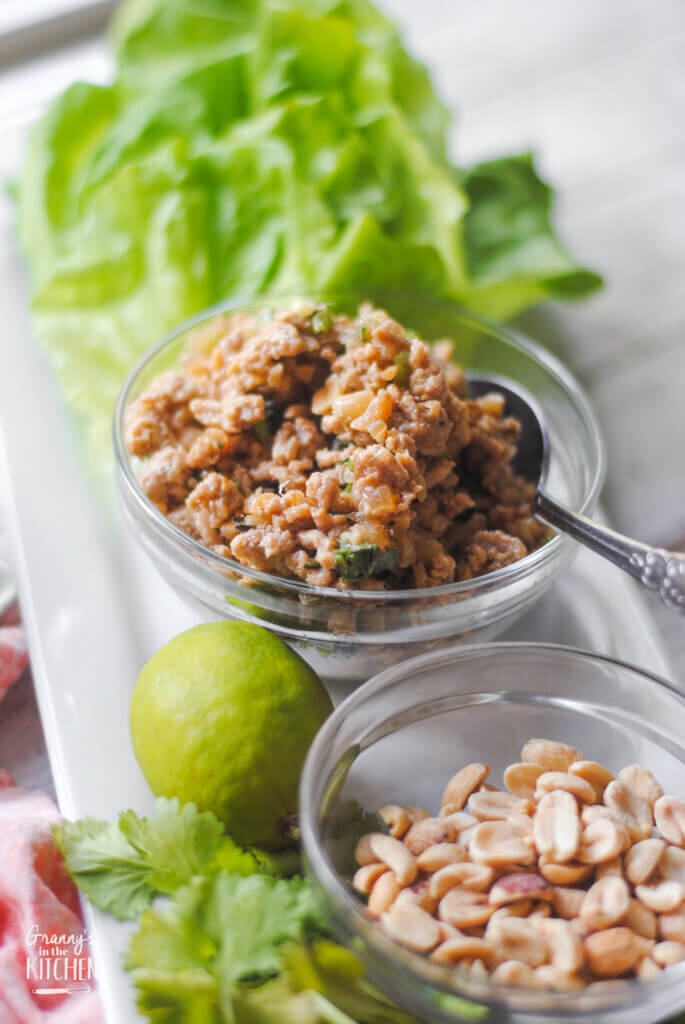 ground chicken in bowl with lettuce cups