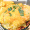 acorn squash stuffed with potatoes and cheese; text overlay "Cheesy Stuffed Acorn Squash"