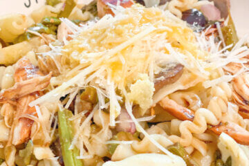pasta with chopped chicken and veggies; text overlay "Tequila Lime Chicken Pasta"