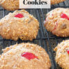 cookies on a wire rack with cherry on top; text overlay "Cherry Wink Cookies"