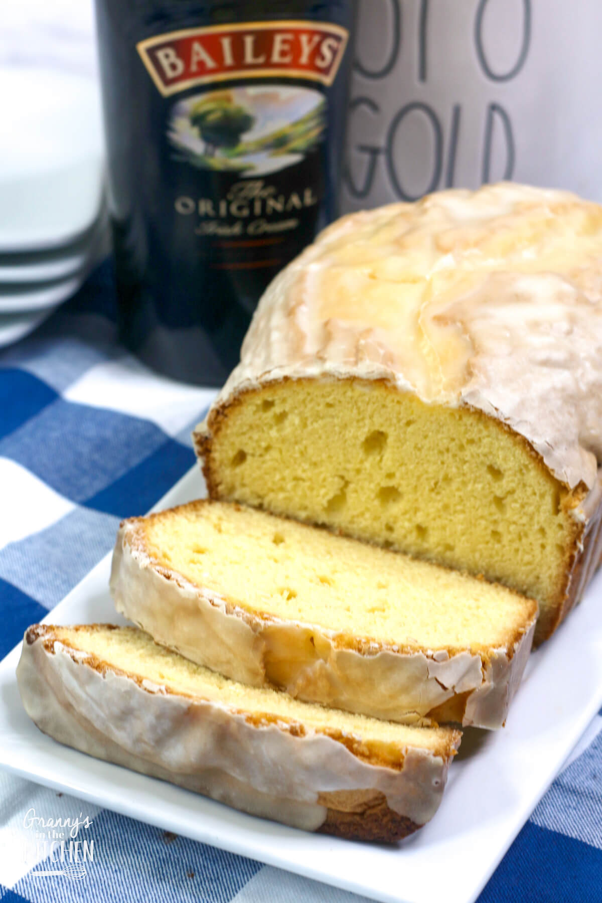 loaf of pound cake with bottle of Bailey's in background