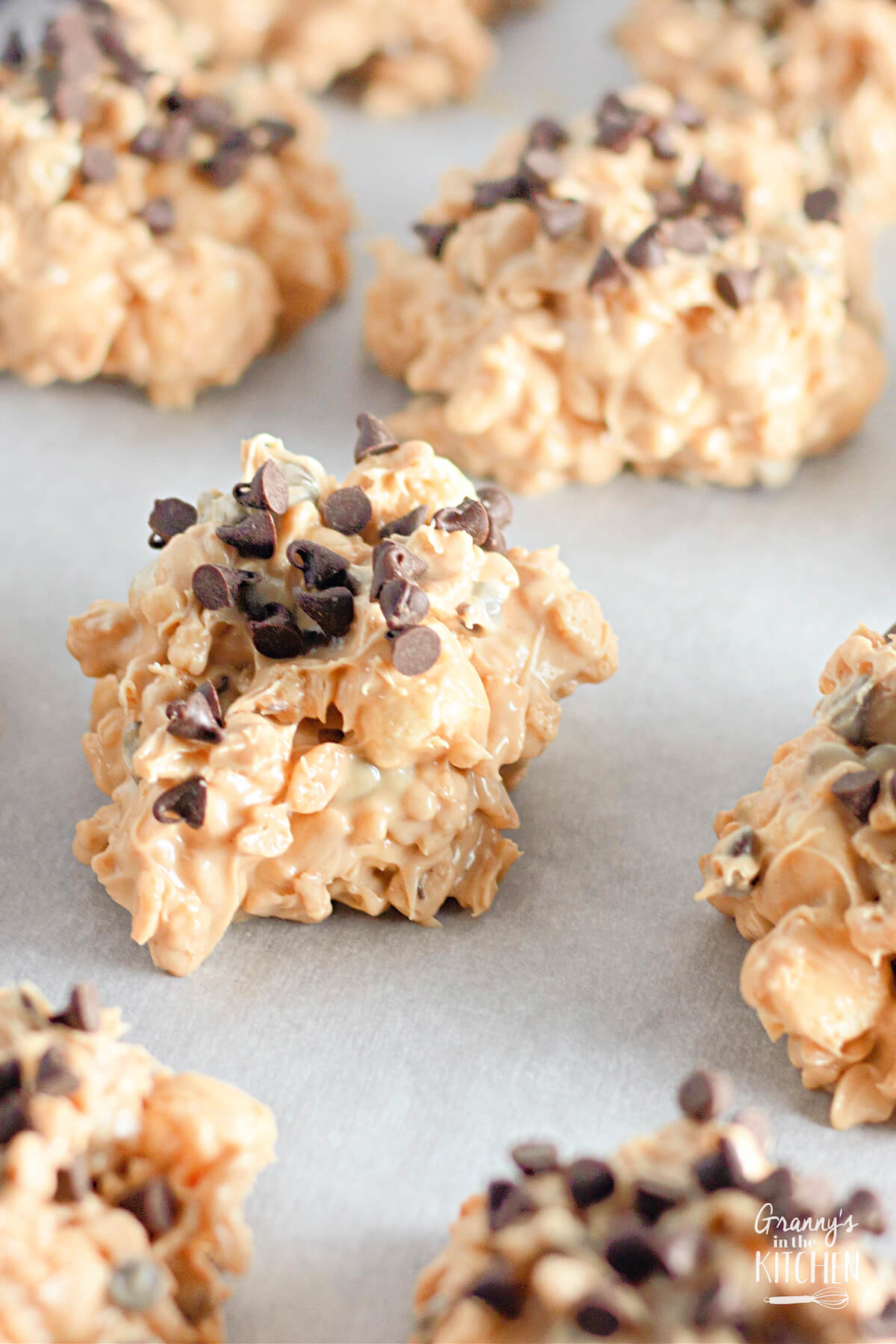 close up of no bake avalanche cookies, made with peanut butter and mini chocolate chips