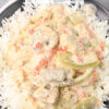chicken and gravy over rice; text overlay "Chicken a la King"