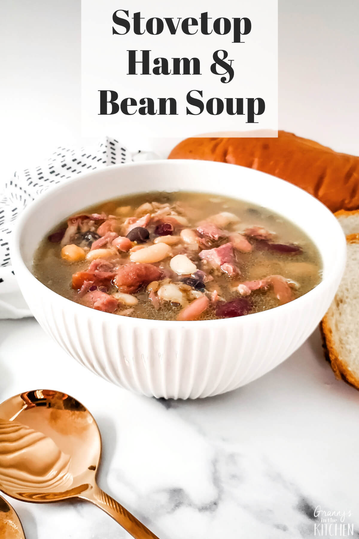 bowl of ham bean soup, with text overlay "Stovetop Ham & Bean Soup"