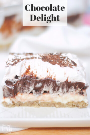 close up of a slice of layered pudding dessert; text overlay "chocolate delight"
