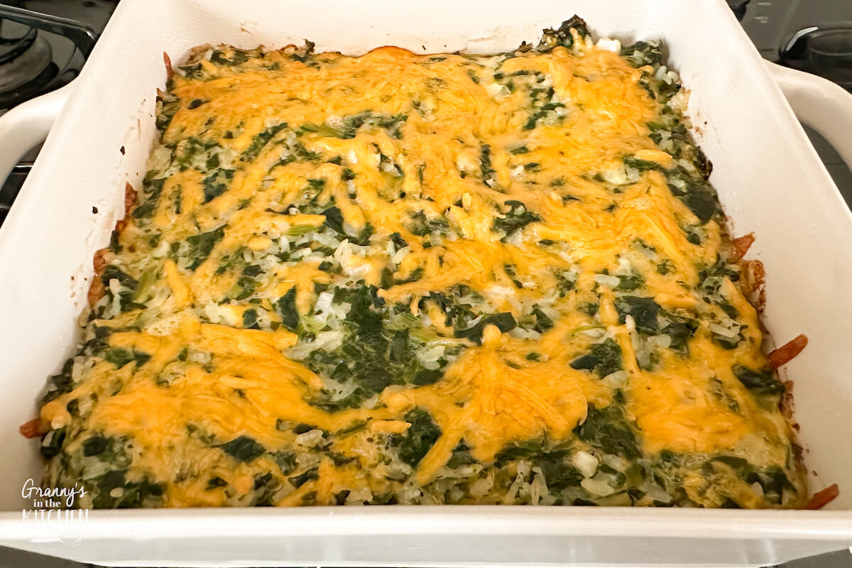 casserole dish with a cheesy spinach casserole.