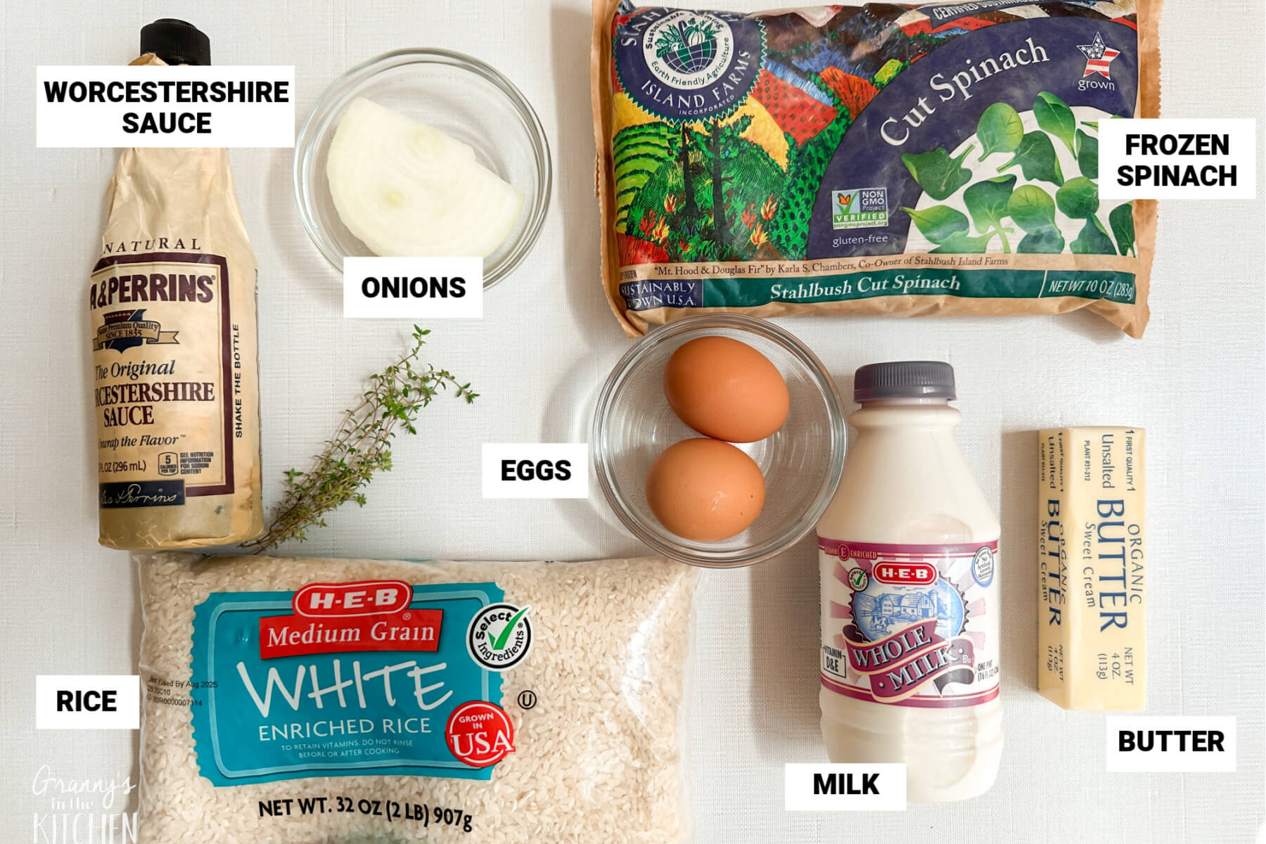 ingredients to make a spinach rice bake: Worcestershire sauce, eggs, milk, butter, spinach, onion, rice.
