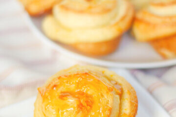 homemade orange rolls with text overlay of recipe name.