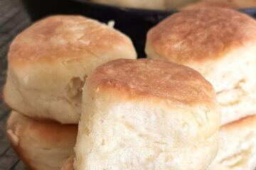 fluffy biscuits with text overlay "Angel Biscuits".