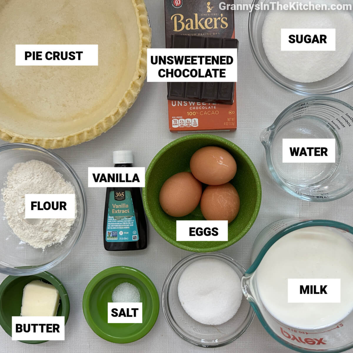 ingredients to make chocolate meringue pie, with text labels.