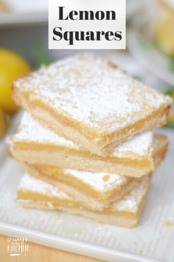 stack of homemade lemon bars, text overlay "Lemon Squares".