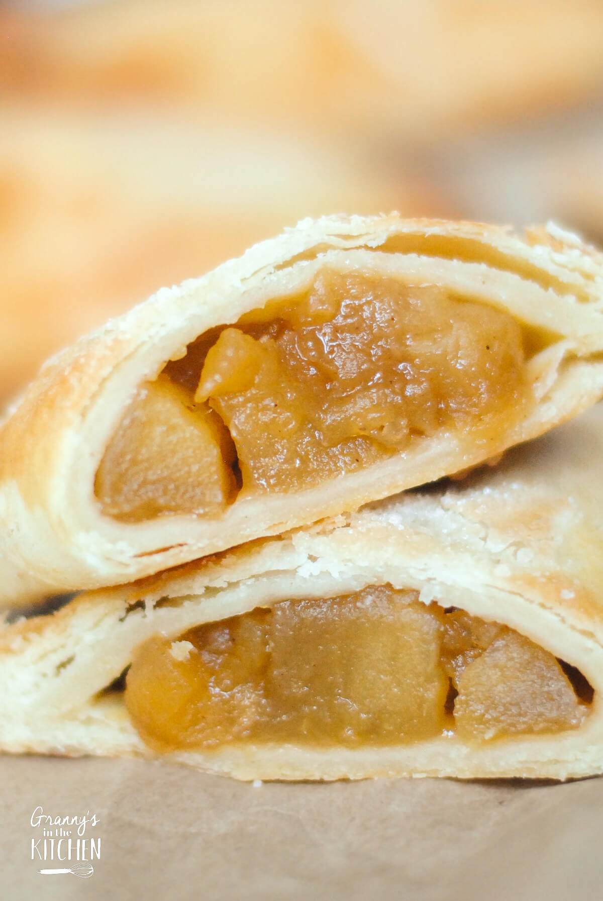 apple hand pie, cut in half, to show detail.