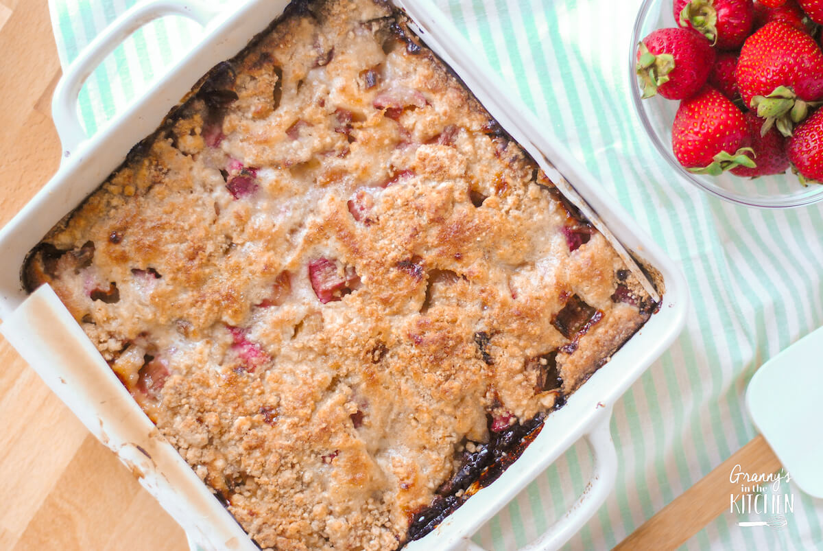 top-down view of rhubarb buckle cake in pan.