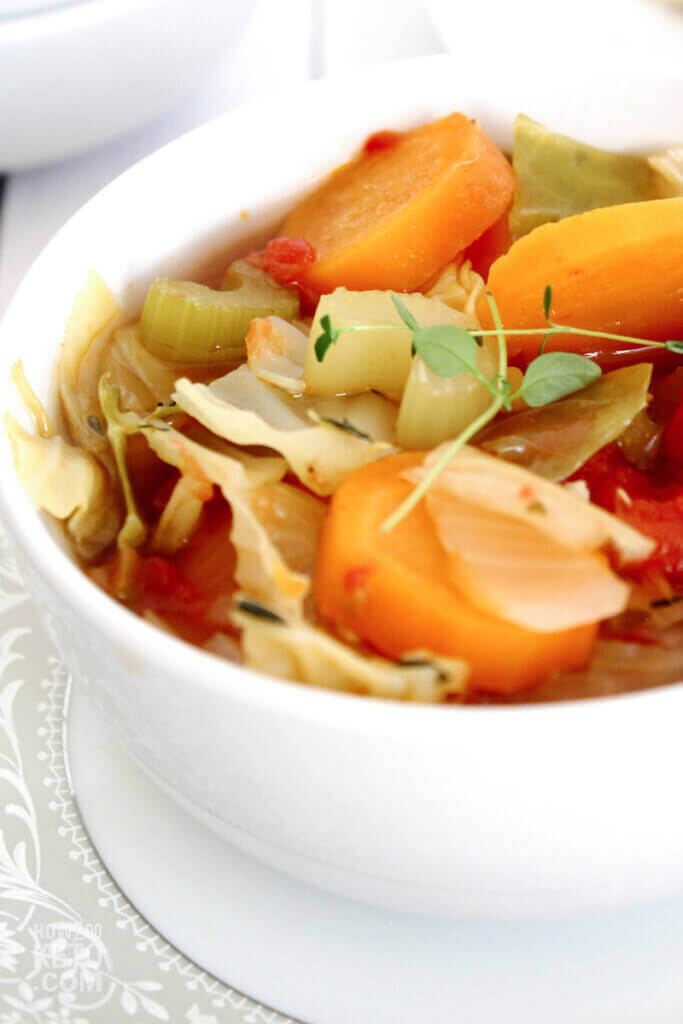 bowl of cabbage and vegetable soup.