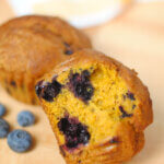 pumpkin blueberry muffin, with a bite taken.