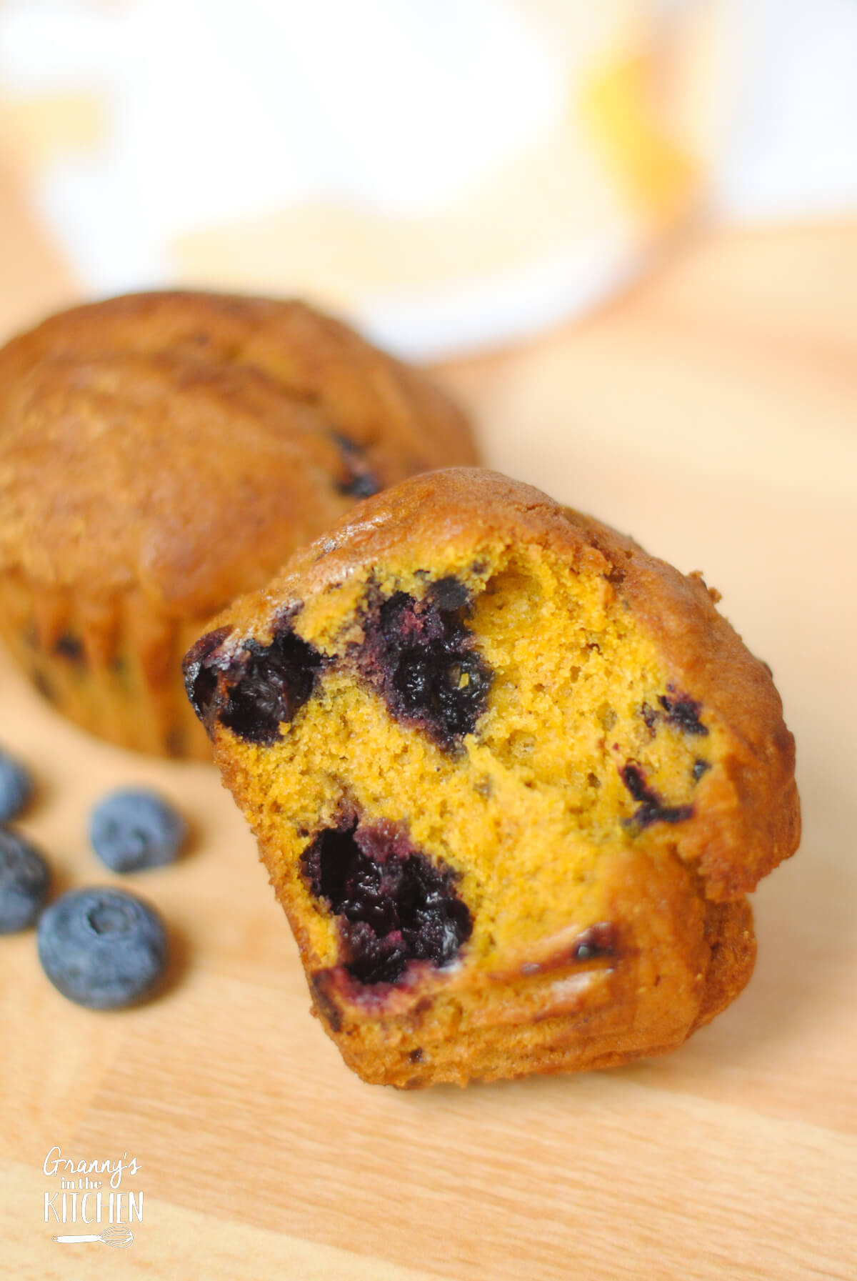 pumpkin blueberry muffin, close up, with bite taken.