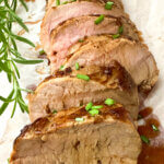 close up of sliced pork tenderloin to show detail.