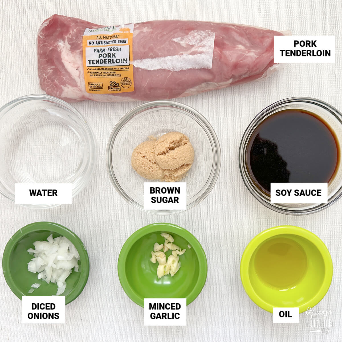 marinated pork tenderloin ingredients, with text labels: water, brown sugar, soy sauce, onions, garlic, oil.