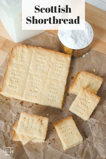 top down view of shortbread on parchment paper; text overlay "Scottish Shortbread."