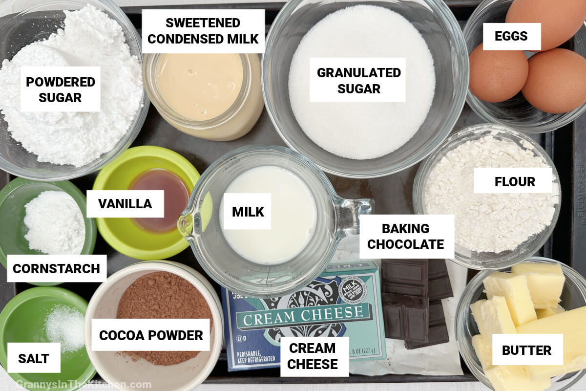 ingredients to make cheesecake brownies, with text labels.