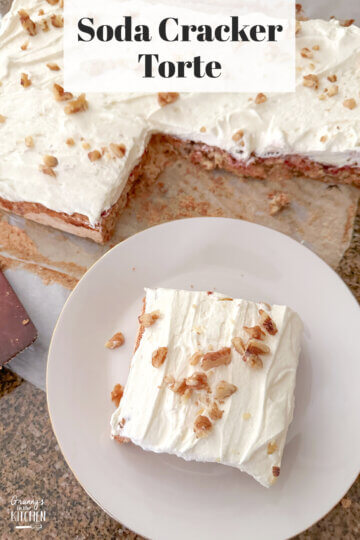 top down view of a soda cracker torte, with one slice on plate.