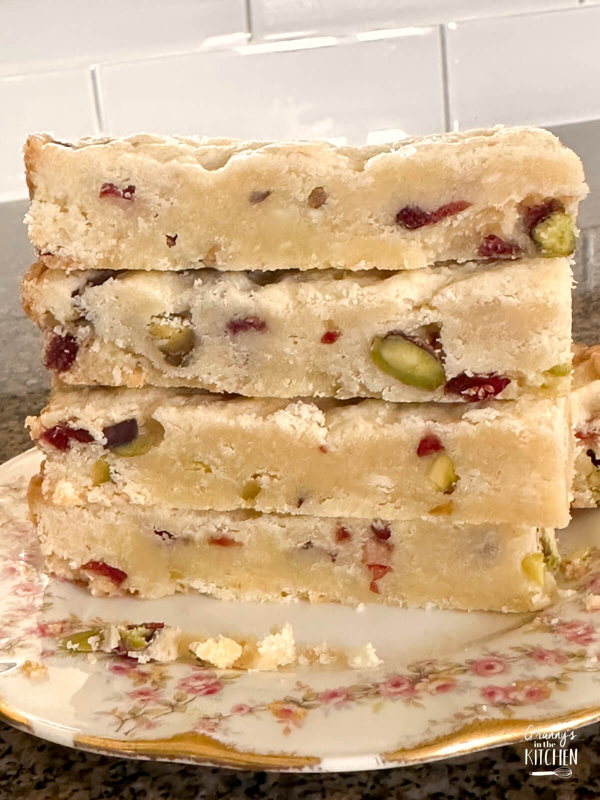 stack of shortbread filled with cranberries, pistachios, and white chocolate.