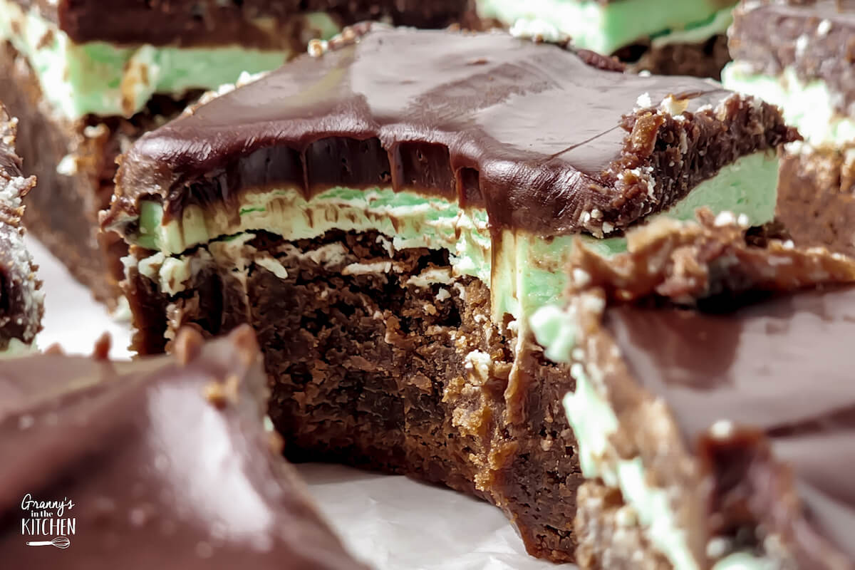 close up of a mint chocolate brownie with a bite taken.