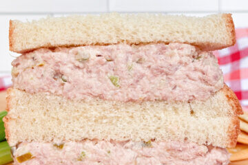 stacked ham salad sandwich, with text overlay "Old-Fashioned Ham Salad."