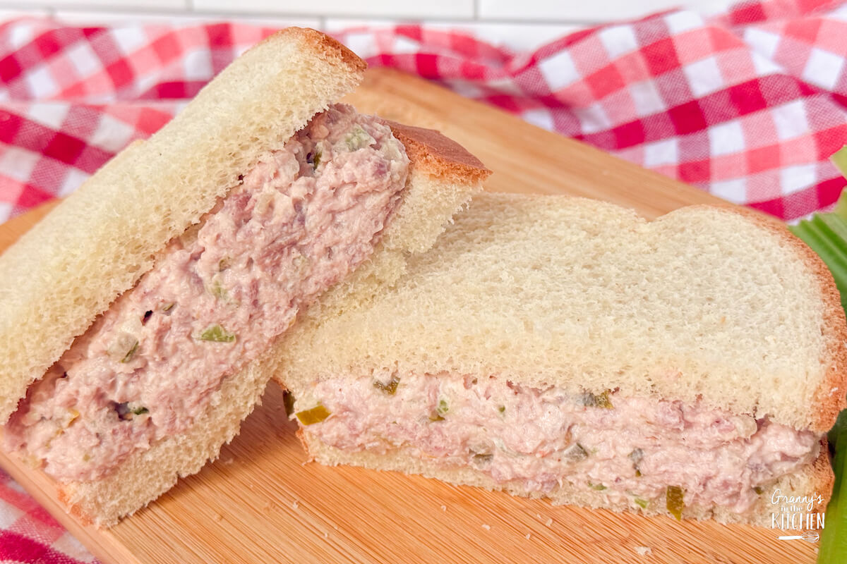 ham salad sandwich on cutting board.