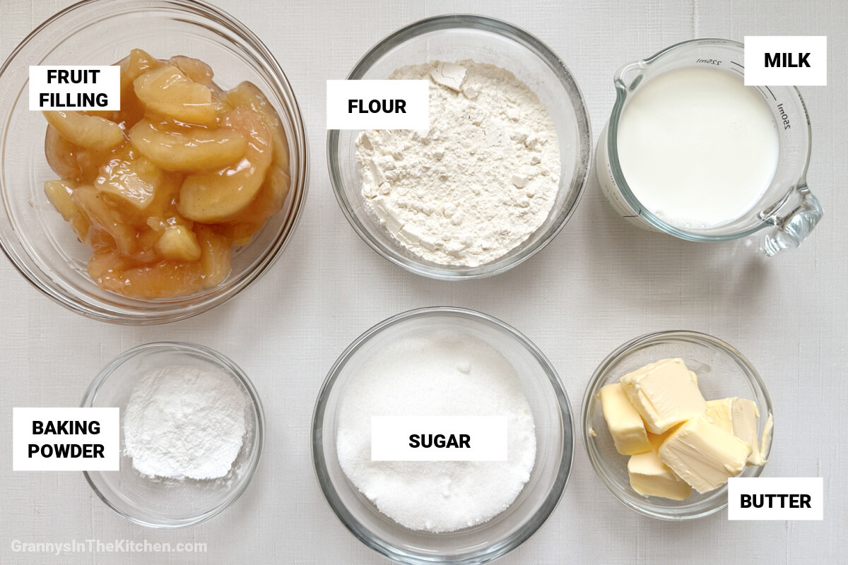 hillbilly cobbler ingredients, with text labels: fruit filling, flour, milk, baking powder, sugar, butter.