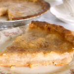 water pie, slice on plate and full pie in background.