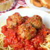 bowl of spaghetti and meatballs, text overlay "Italian Meatballs."